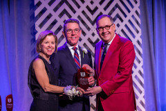 left: Yvonne Cordell, Joseph Cordell, Chancellor Andrew Martin